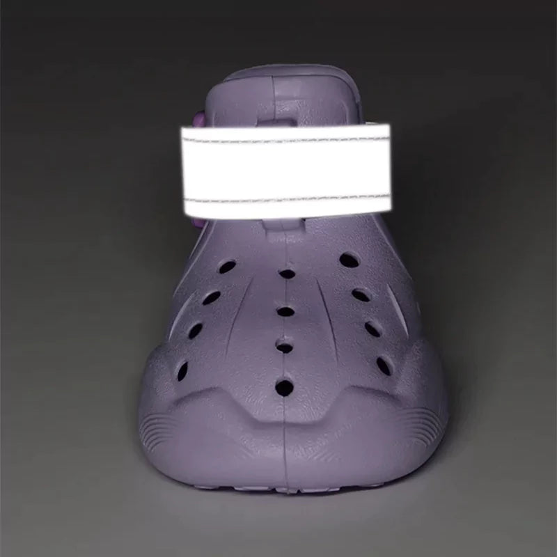 Purple clog shoe on a gray background