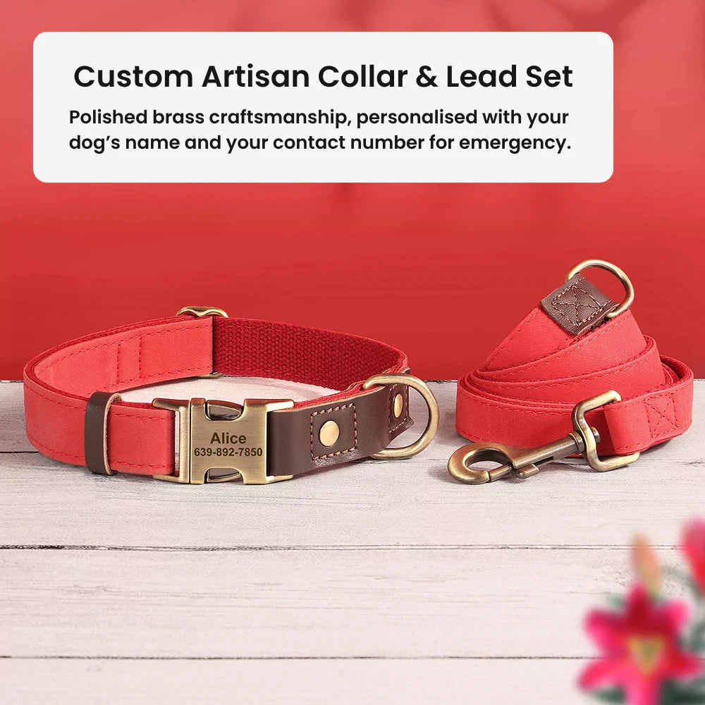 Red dog collar and lead set with engraved name and contact number on a wooden surface.