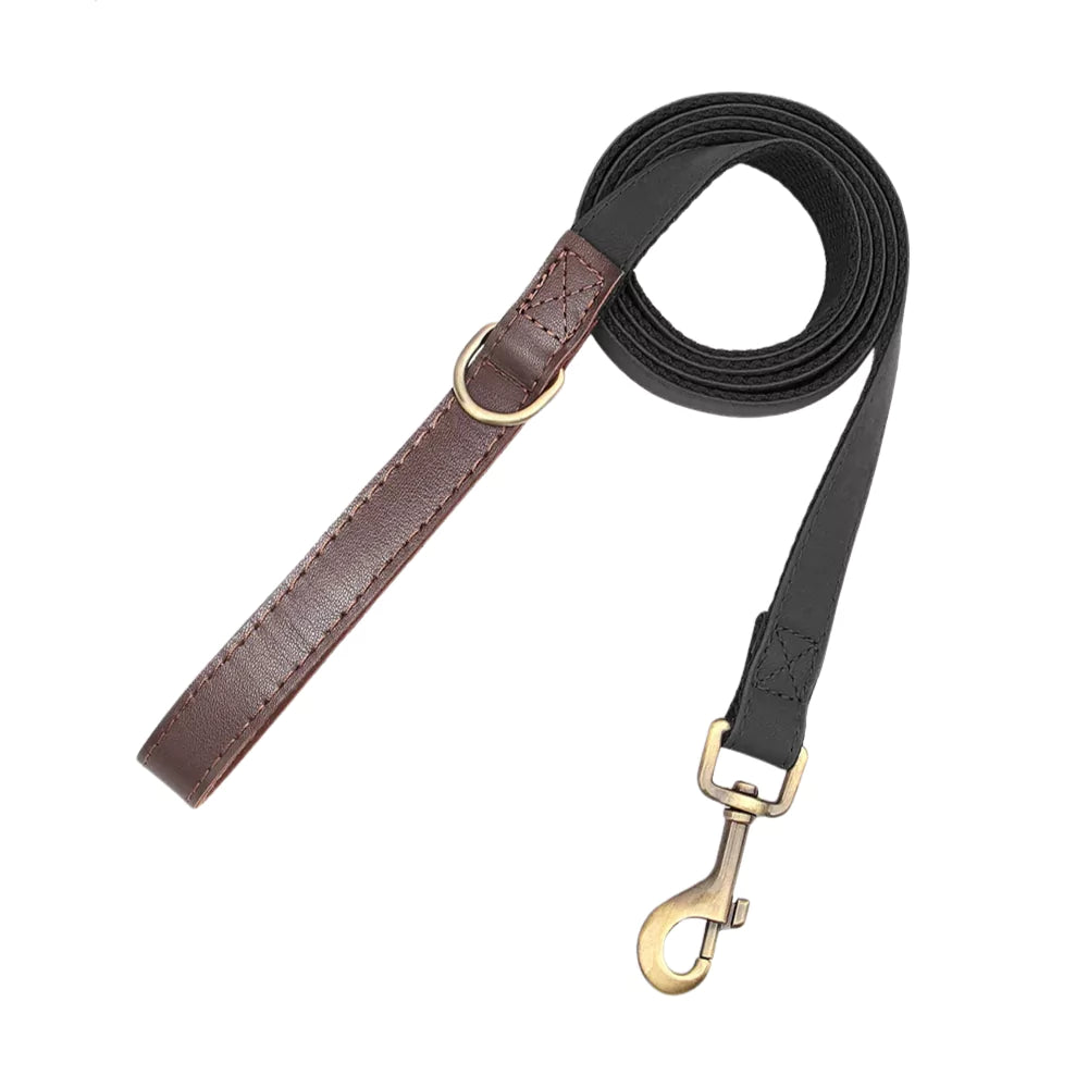 Dog leash with brown leather and black plastic sections on a white background
