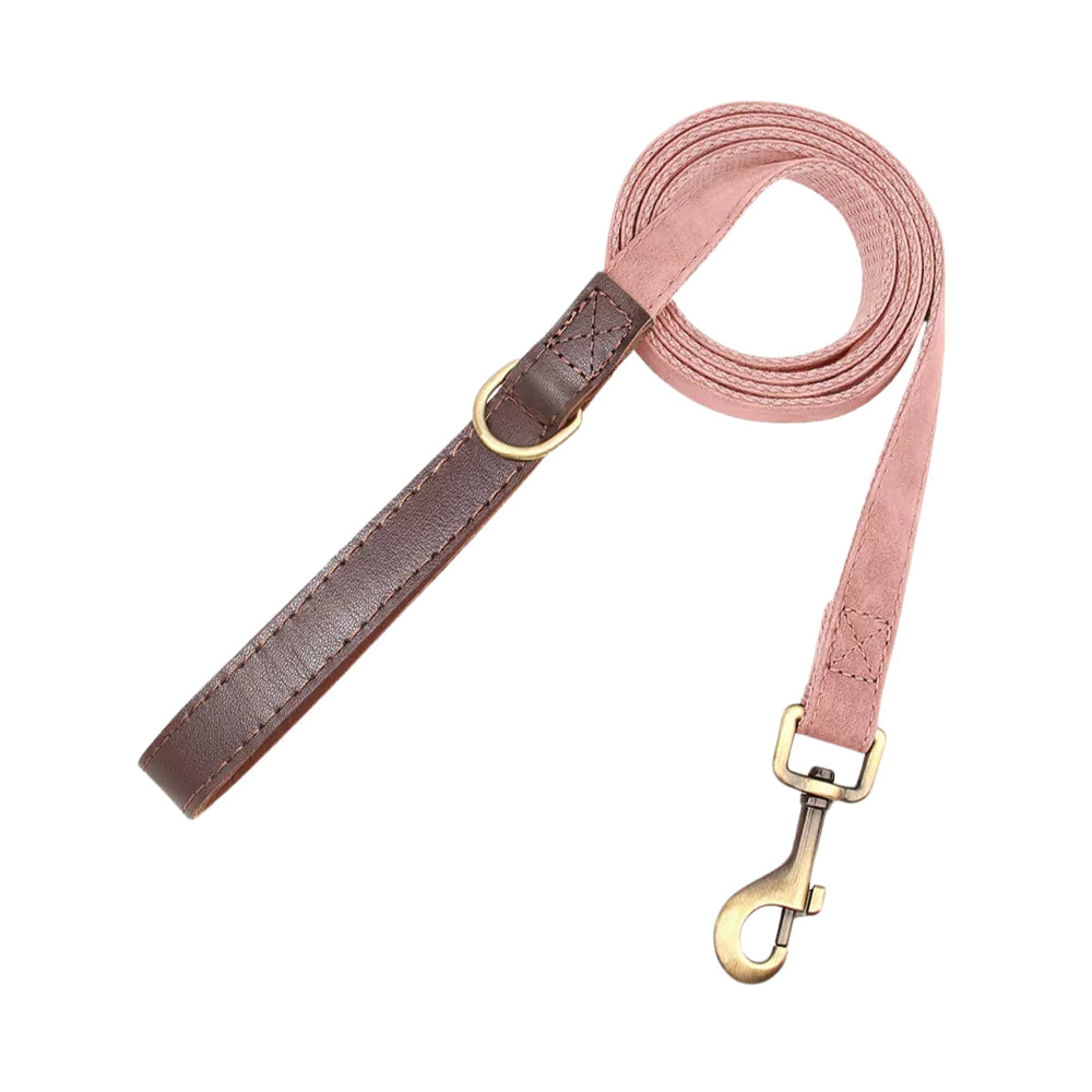 Dog leash with pink and brown leather sections on a white background
