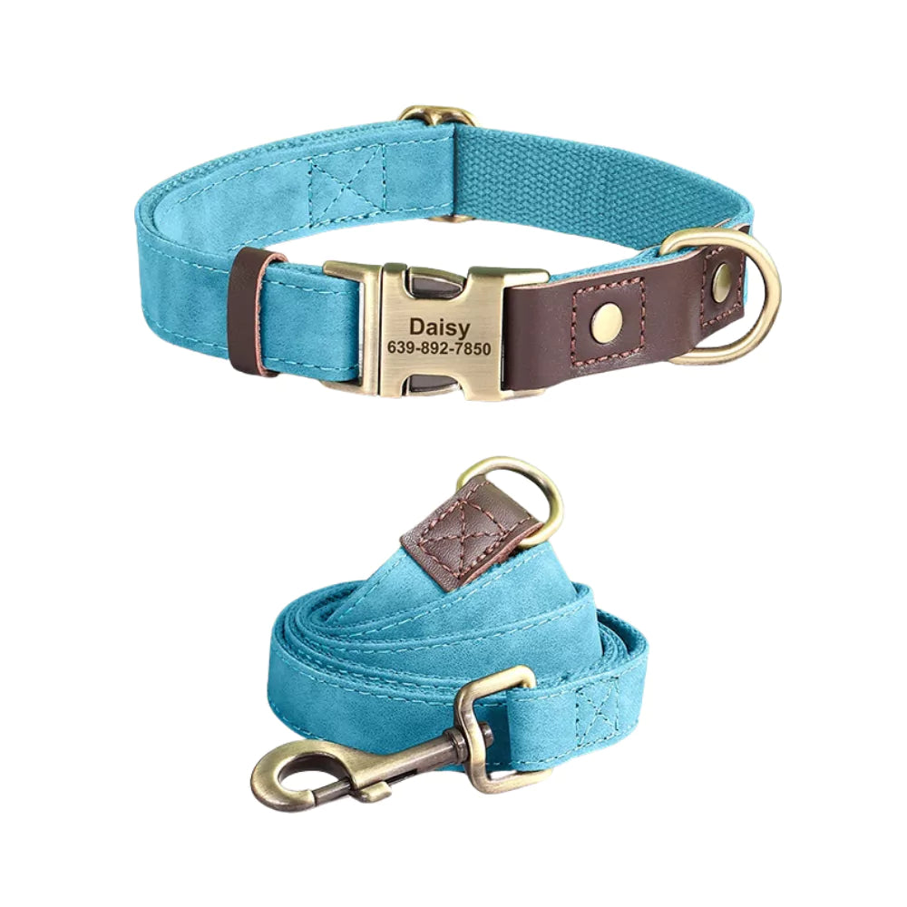 Blue dog collar and leash set with a personalized engraved buckle on a white background