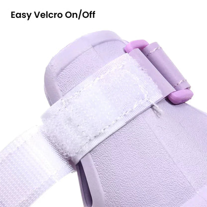 Close-up of a purple shoe with an easy velcro on/off system on a white background.